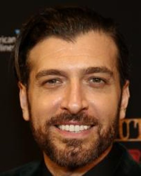 Tam Mutu Headshot