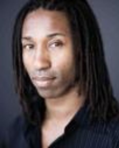 Omari Tau Headshot
