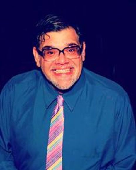 Greg Santos Headshot