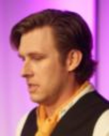 Travis Horseman Headshot