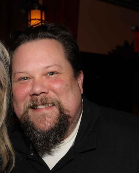 Justin 'Squiggs' Robertson Headshot