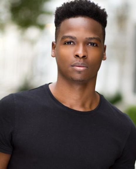 Aramie  Headshot