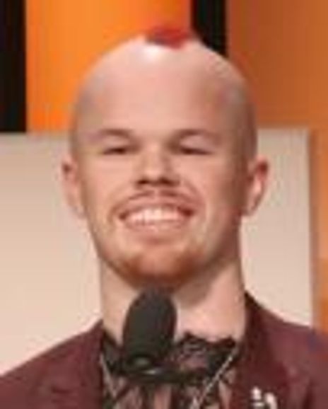 Sam Brinton Headshot