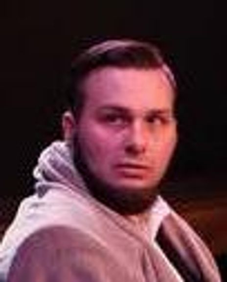 Robert Schmiegel Remigio Headshot