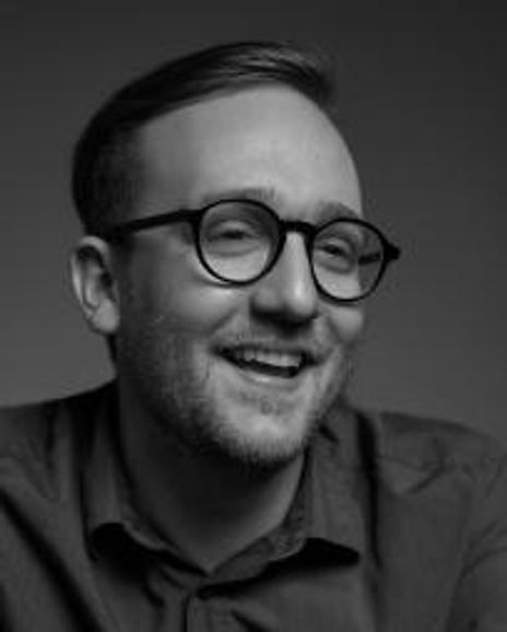 Joshua Warner Headshot