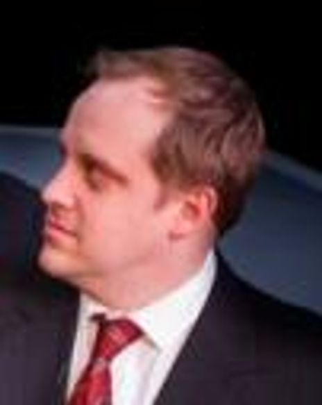 Aleks Merilo Headshot