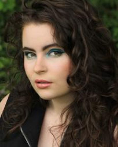 Alara Magritte Magritte Headshot