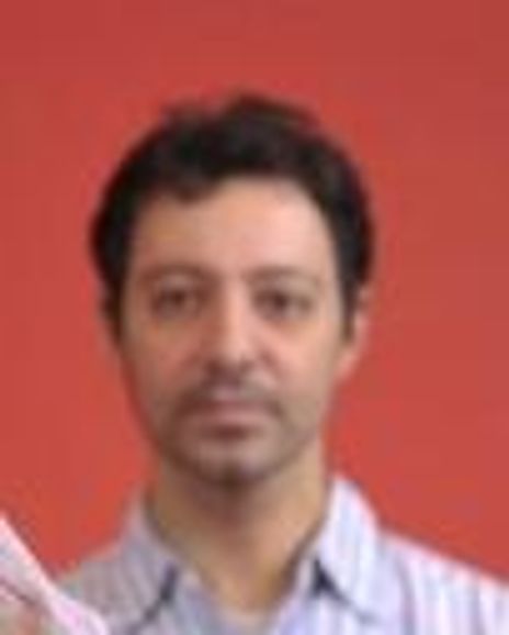 Amir Sharafeh Headshot