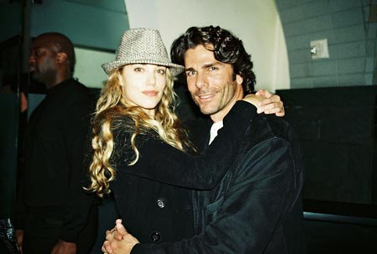 Elizabeth Berkley and Greg Lauren at 