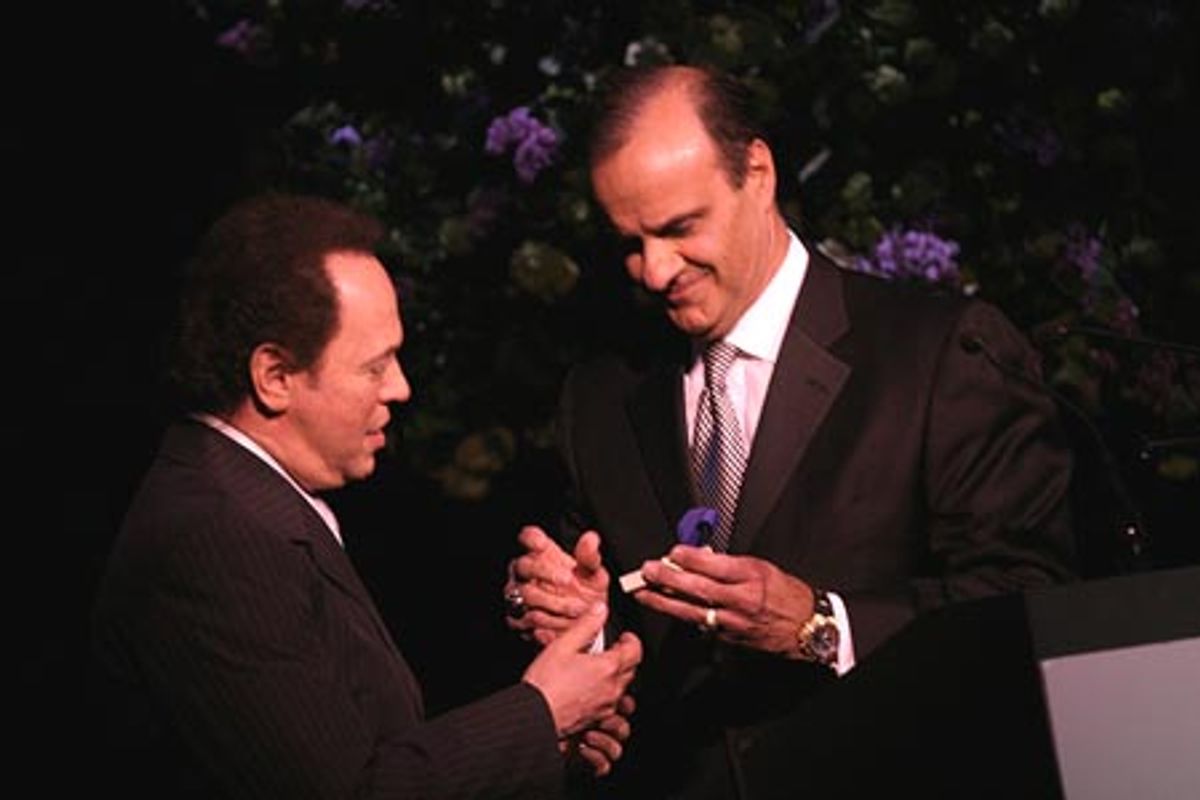 Billy Crystal receives The Actor's Fund's Artistic Achievement Award from Joe Torre

 at 