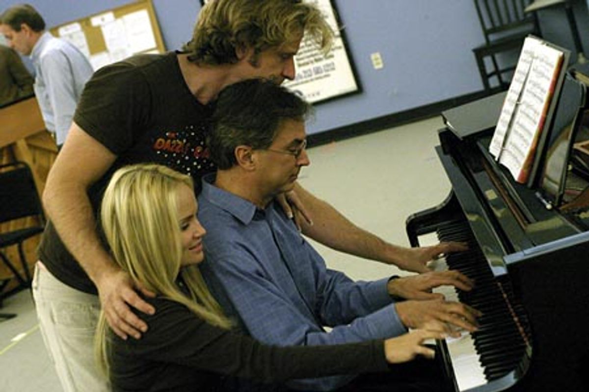 (Clockwise from left) Kristin Chenoweth and Malcolm Gets join Music Director Rob Fisher at the piano during rehearsals for the Encores! production of The Apple Tree. at 