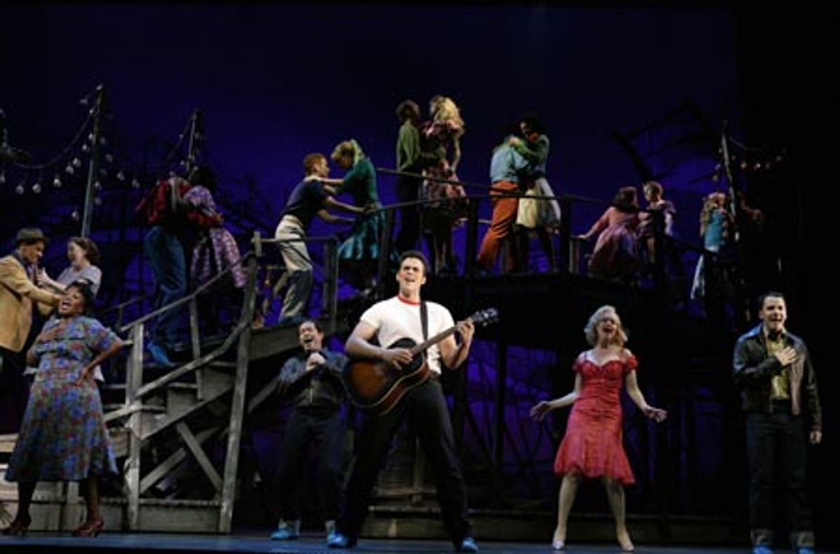 Cheyenne Jackson (center) and the company  at 