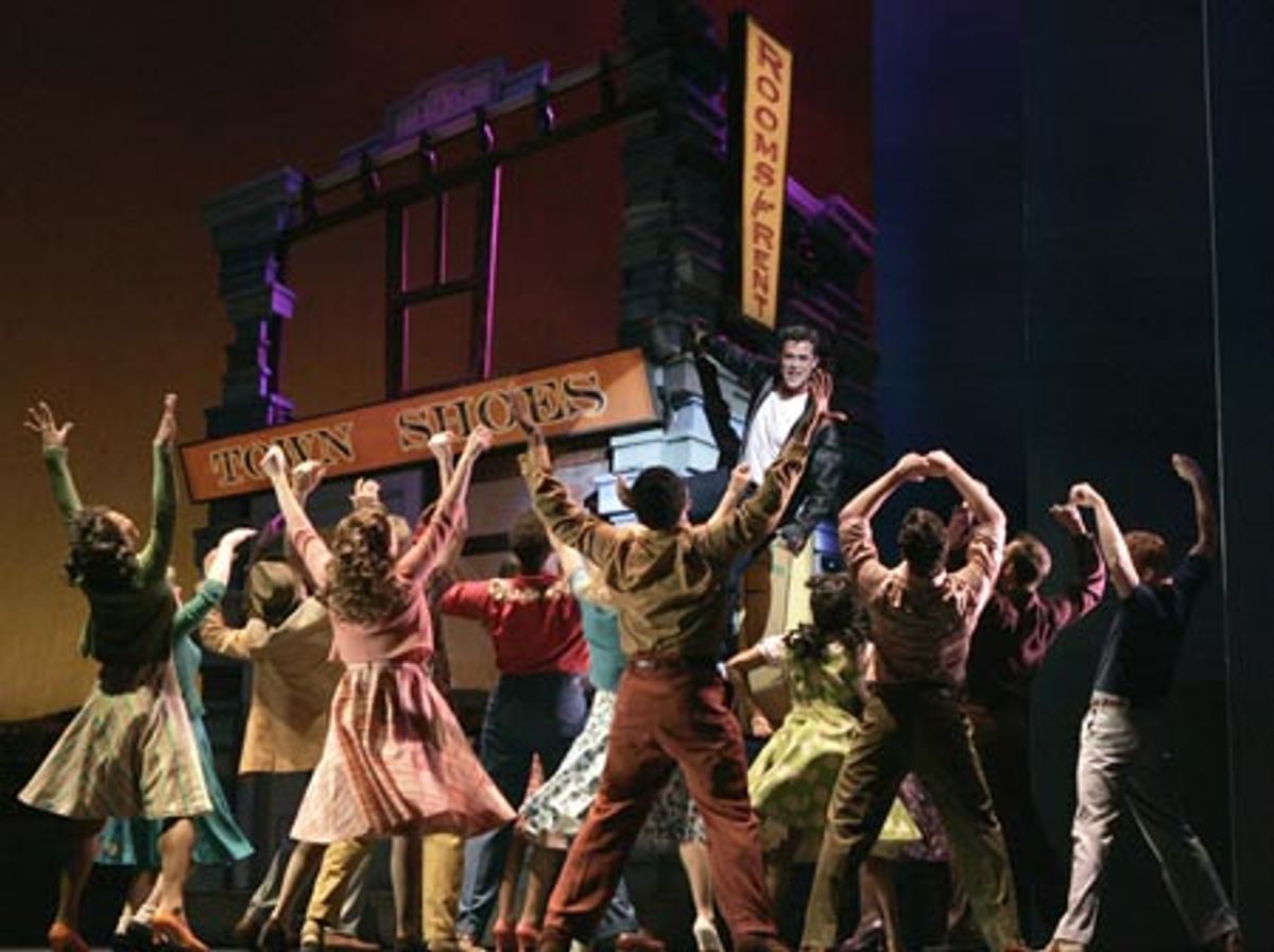 Cheyenne Jackson (center) and the company  at 