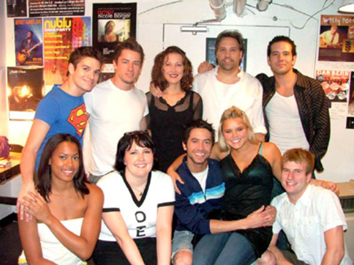 A bunch of the cast backstage before the show at 