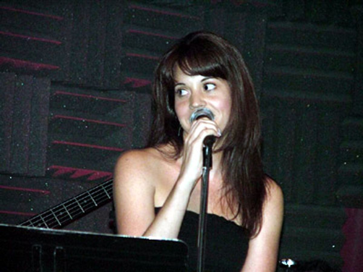 Jenna preps the audience for a 'cut' number from BARE at 