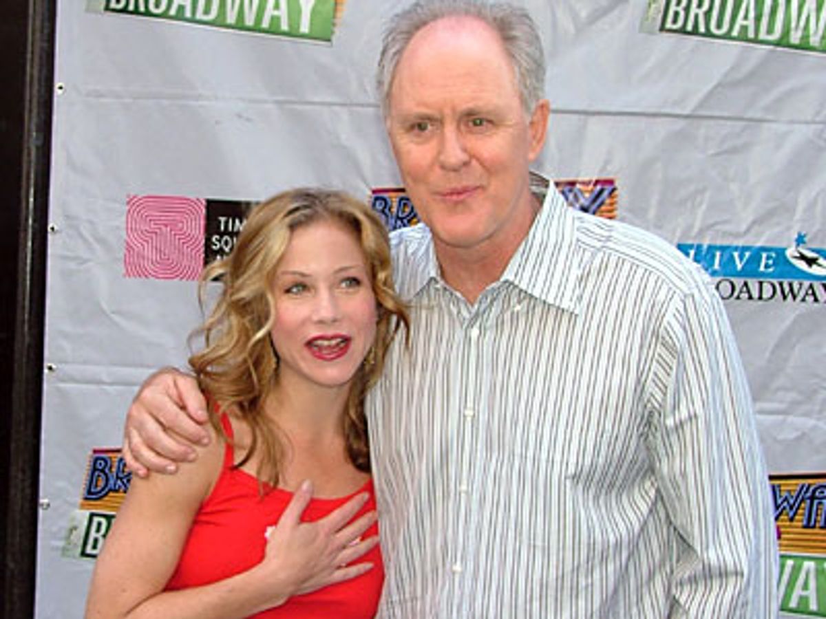 Co-hosts for the concert, Christina Applegate and John Lithgow at 
