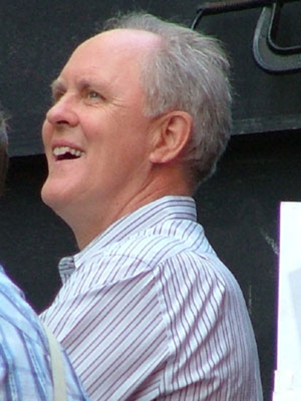 John watches his co-host perform in
'Hey Big Spender' at 