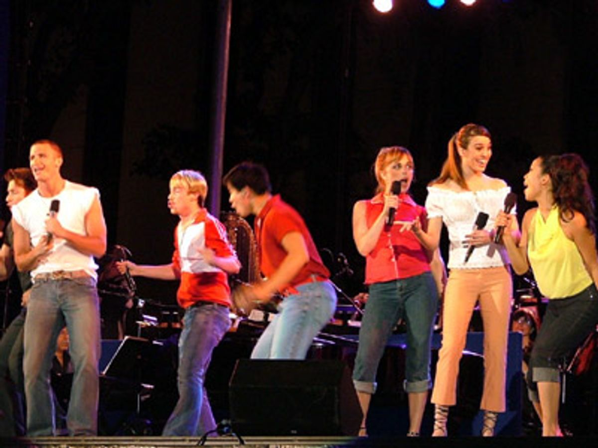 What song couldn't be more appropriate to sing this season?
John Hill, Christy Carlson Romano and Ensemble sing
the familiar favorite 'Summer Nights' at 