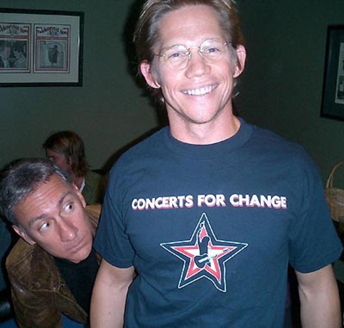 David Garrison checking out director Jack Noseworthy's t-shirt  at 