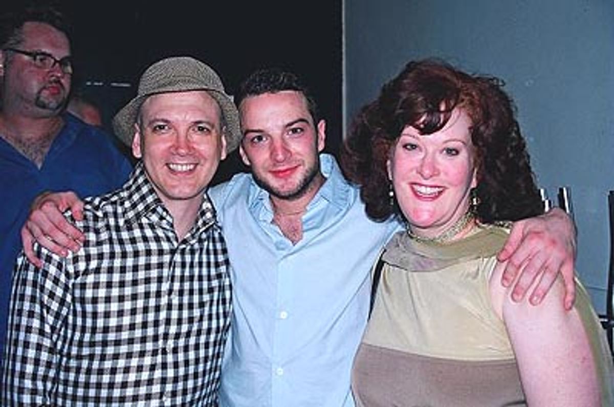 Charles Busch and Liz McCartney congratulate Euan at 