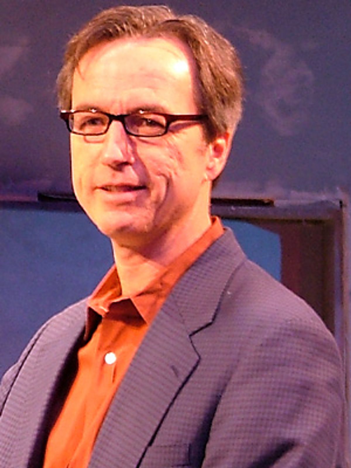 Producer Mark Cuddy welcomes the press at 