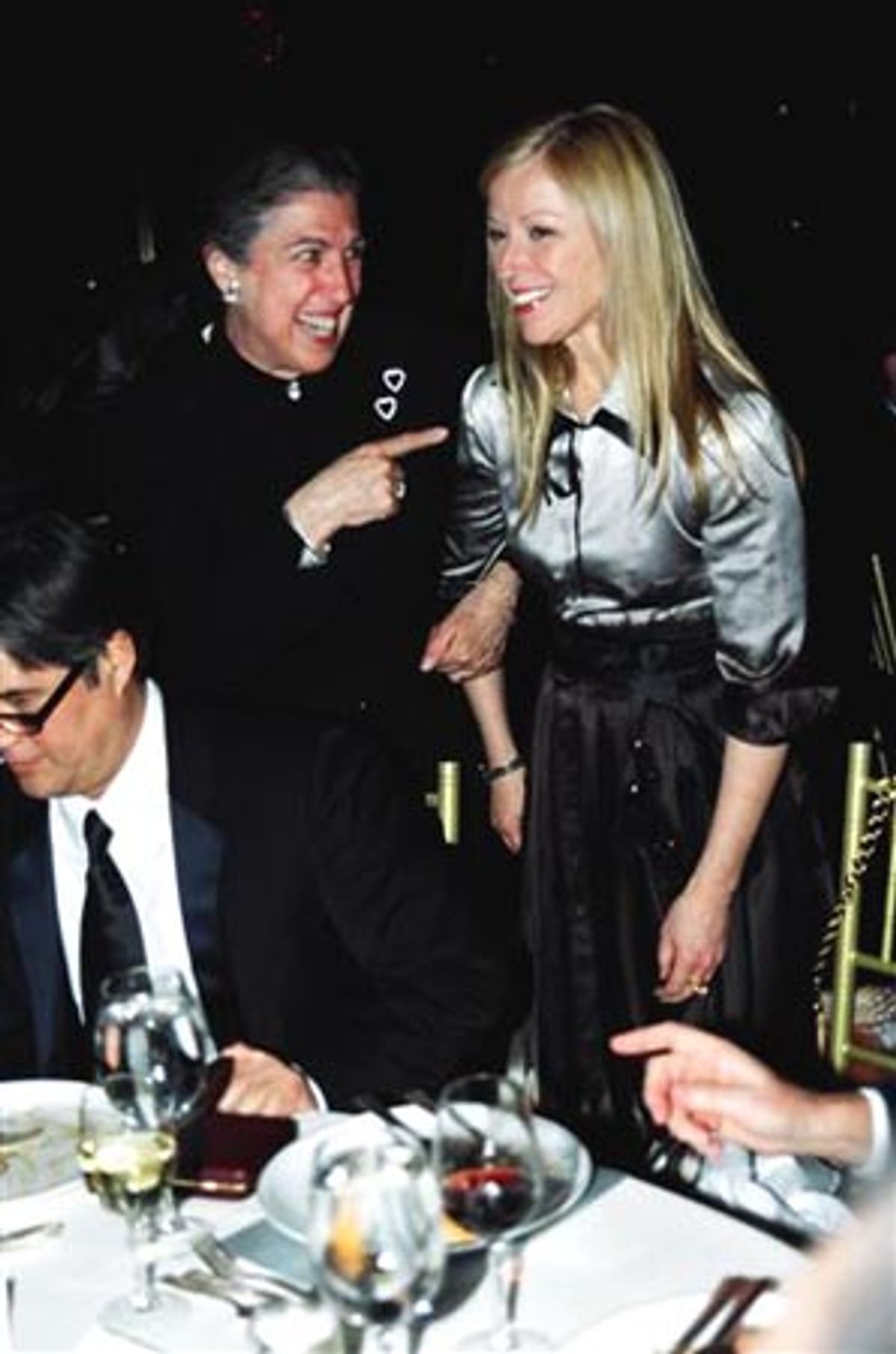 Trustee Patti Kenner makes a point to award winner Cindy Sherman  at 