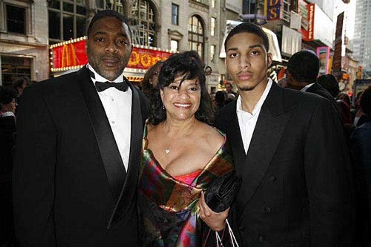 Norm Nixon with his wife Debbie Allen and son at 