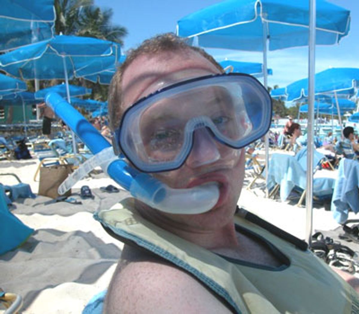Jamie with his snorkel gear...but for some reason, he's wearing it while in his beach chair and not actually IN the water. We don't ask questions...  at 
