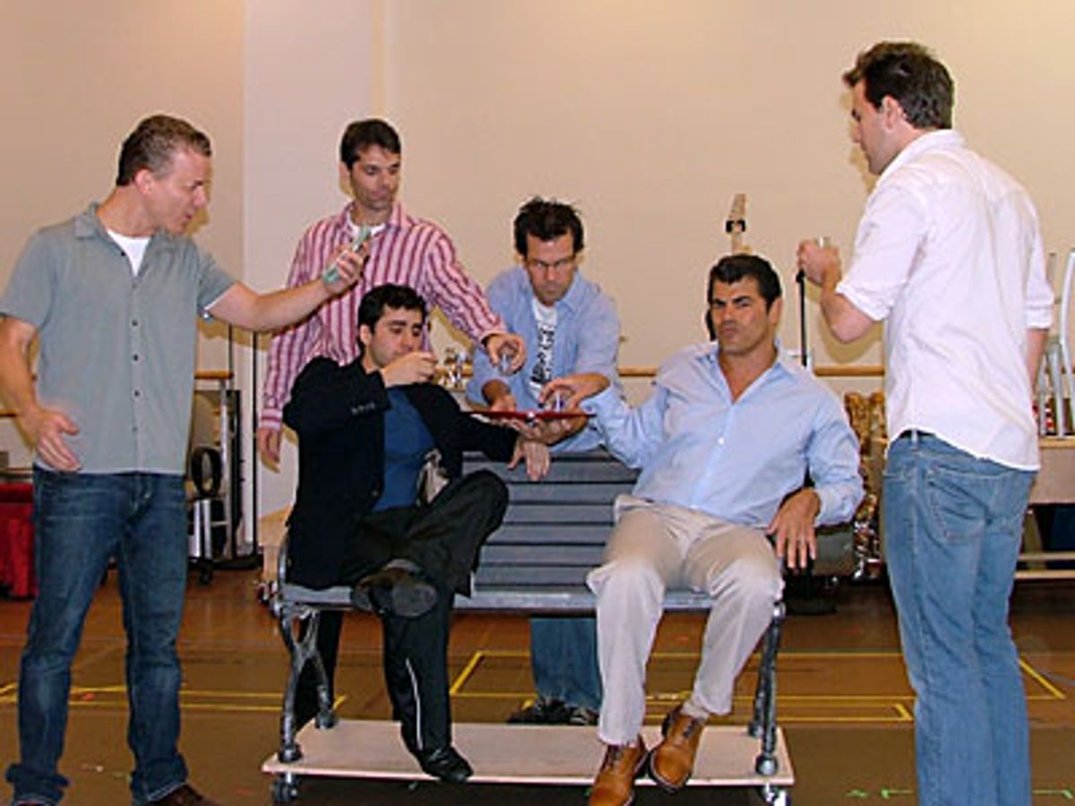 The group toasts to a hit song at 