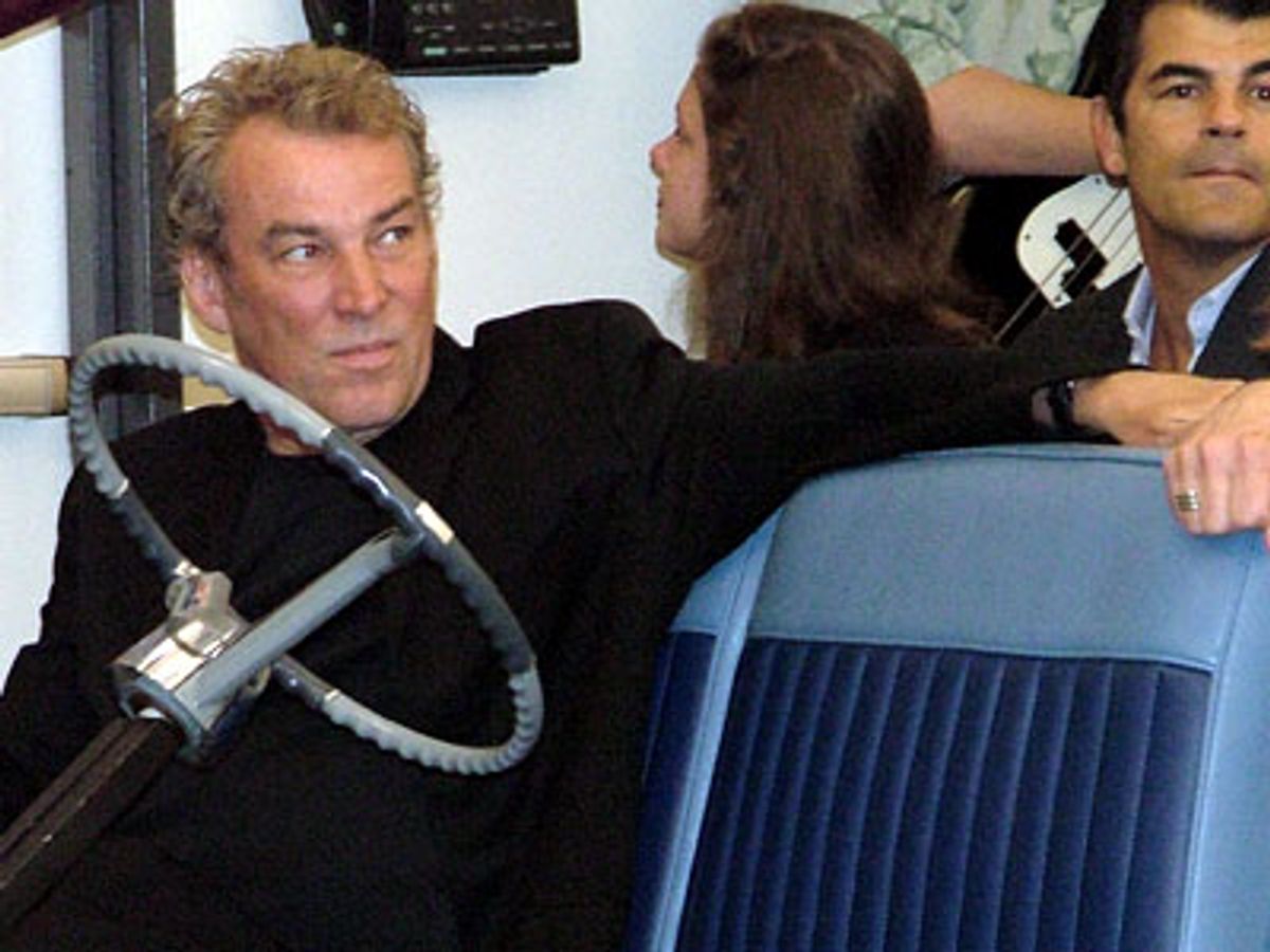 Des watches the scene at 