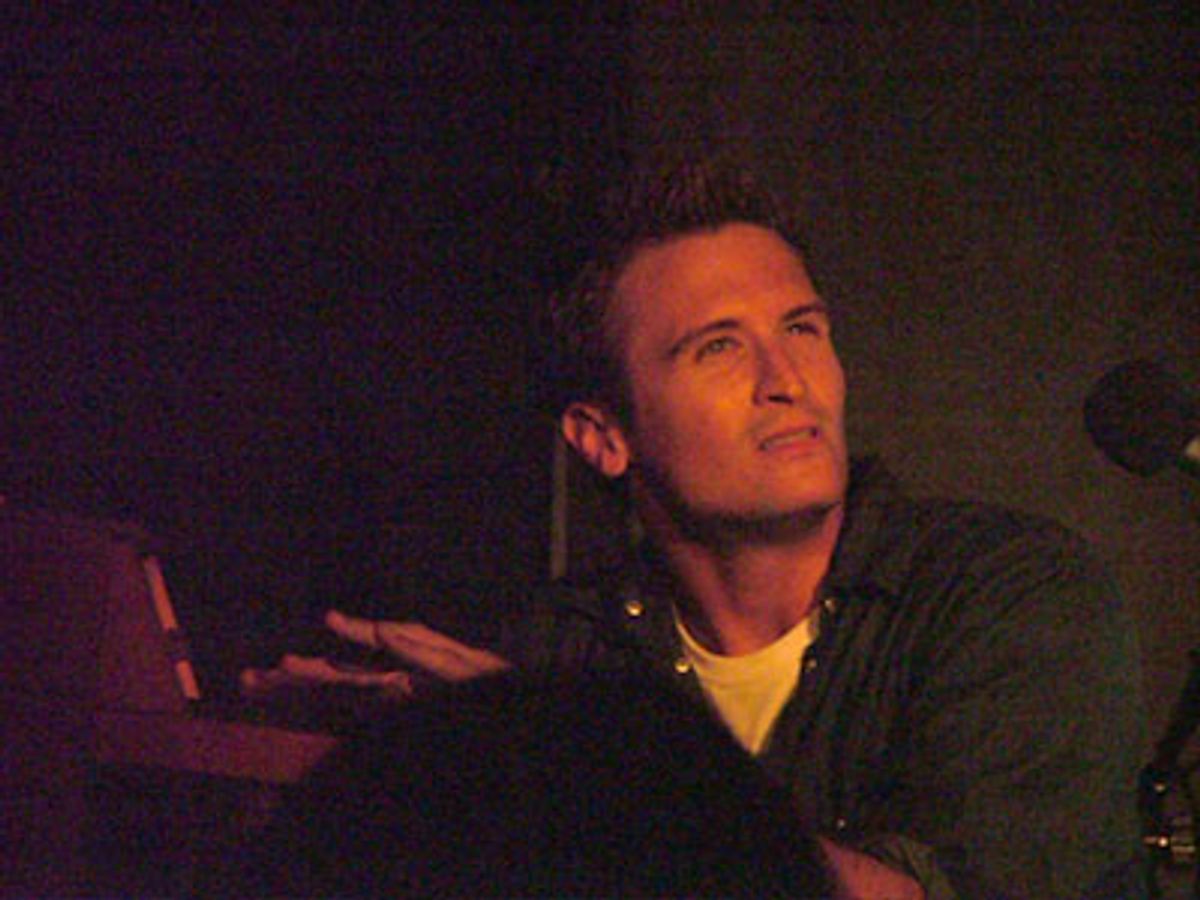 John tickles the mini-ivories... at 