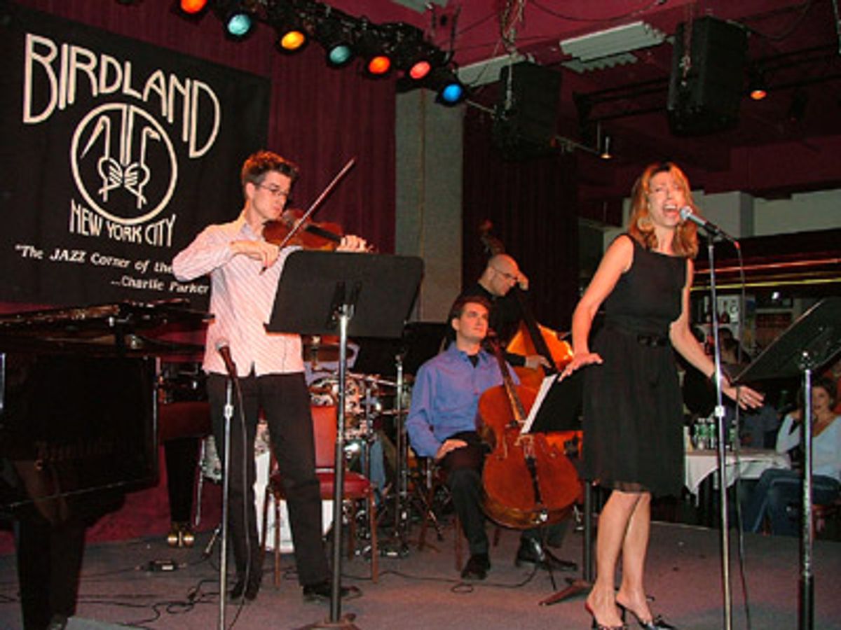 Amanda starts things off with a bang backed by the
Tom Kitt Band at 