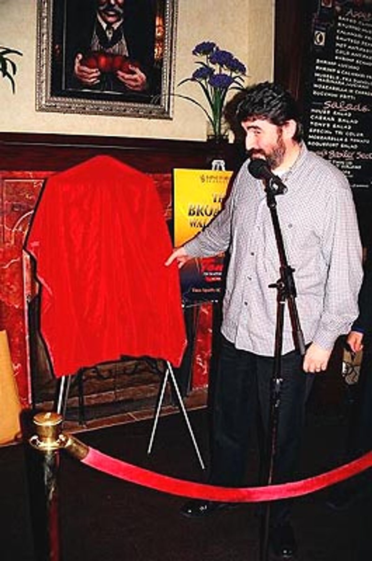 Alfred preparing to unveil his portrait at 