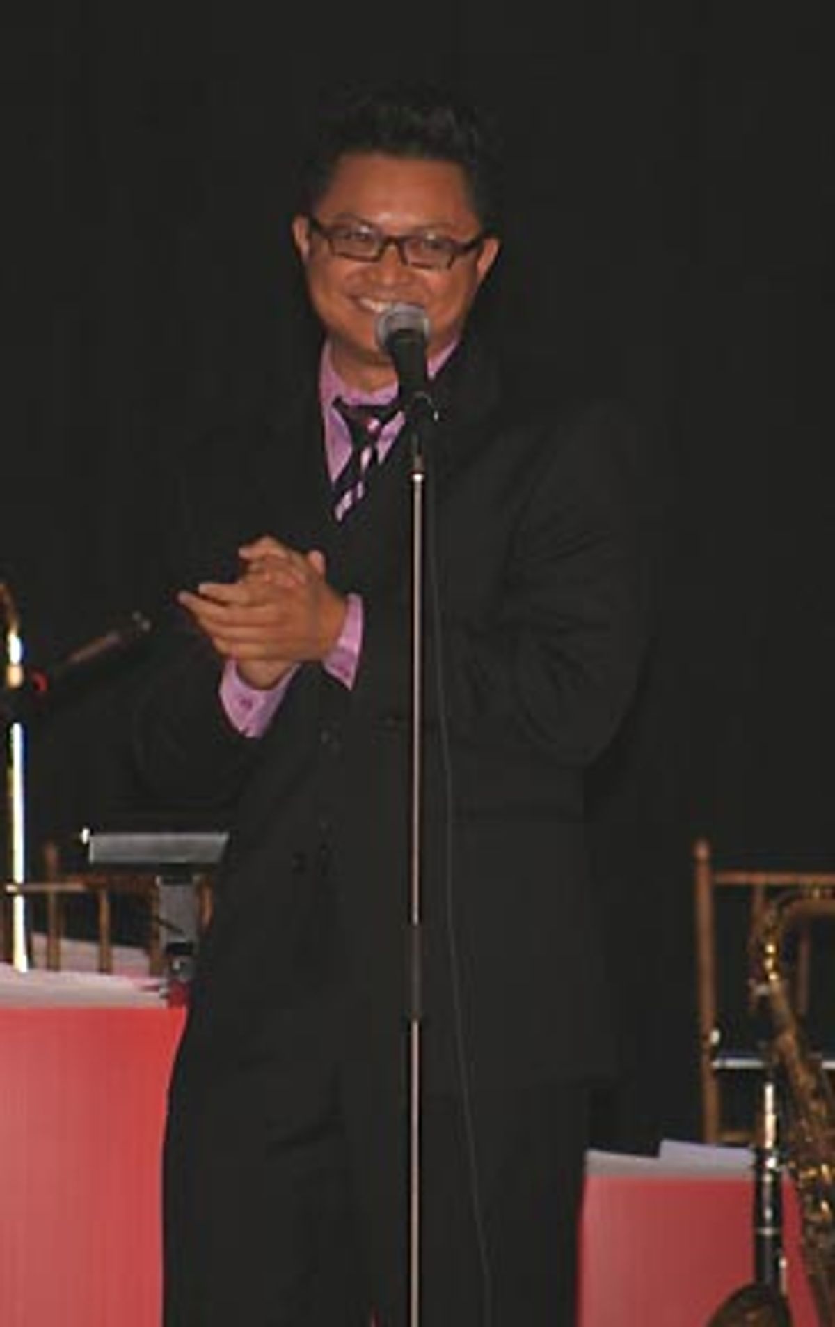 Connie and Carla's Alec Mapa amuses the crowd with a comic monologue all about growing up as a gay Asian who loves musical theatre.  at 