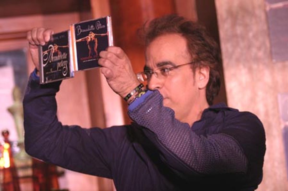 ...showing off the older album, and the new!  at 