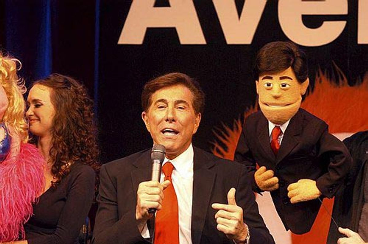 Steve Wynn poses with his puppet

 at 