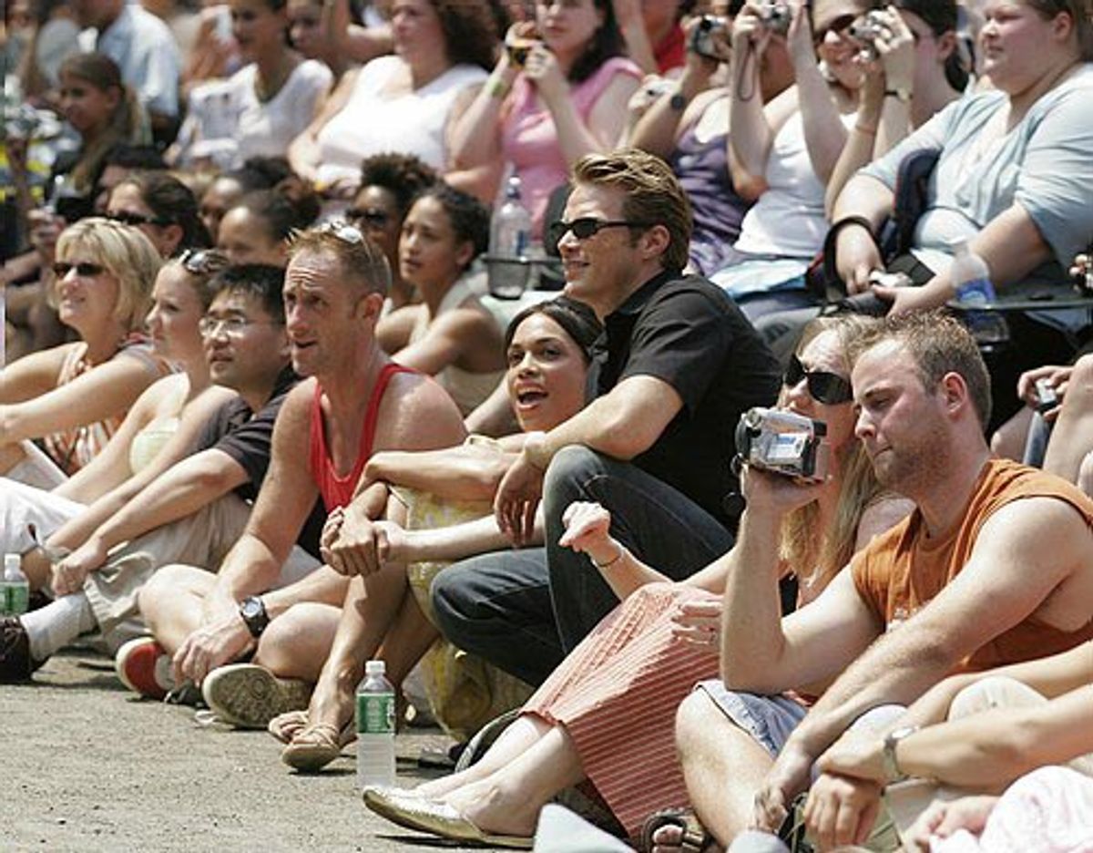 Rosario and Jason watching the show at 