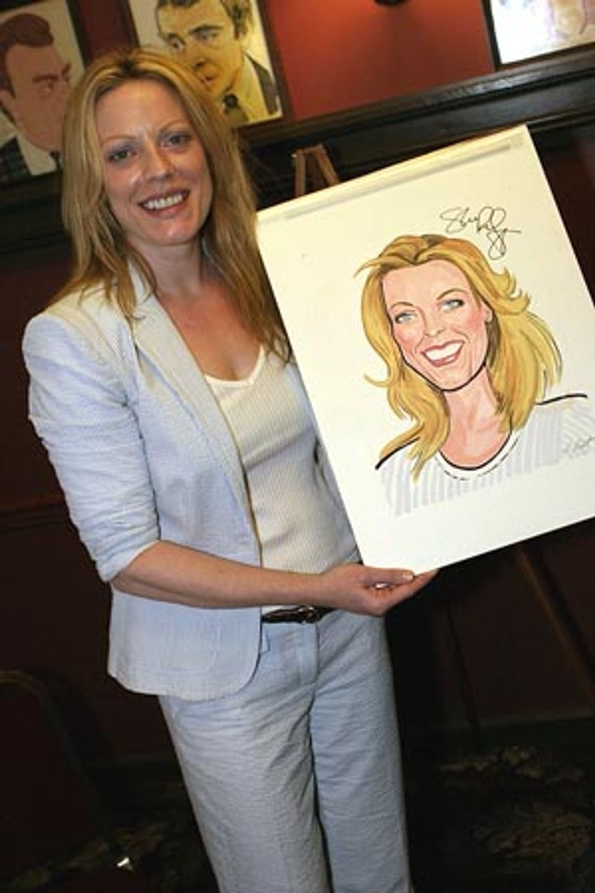 And then poses with it! at 