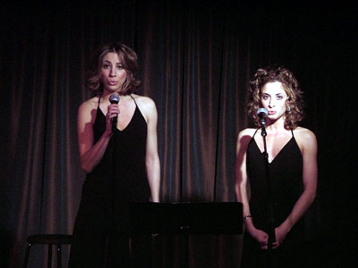 Sisters, Gina and Lyn Philistine received thunderous
applause for their rendition of 'I Will Never Leave You'  at 