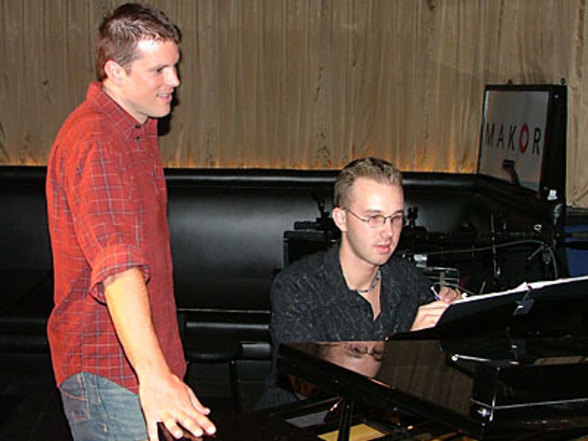 Manley Pope and musical director, Matt Richardson go over some
last minute details at 