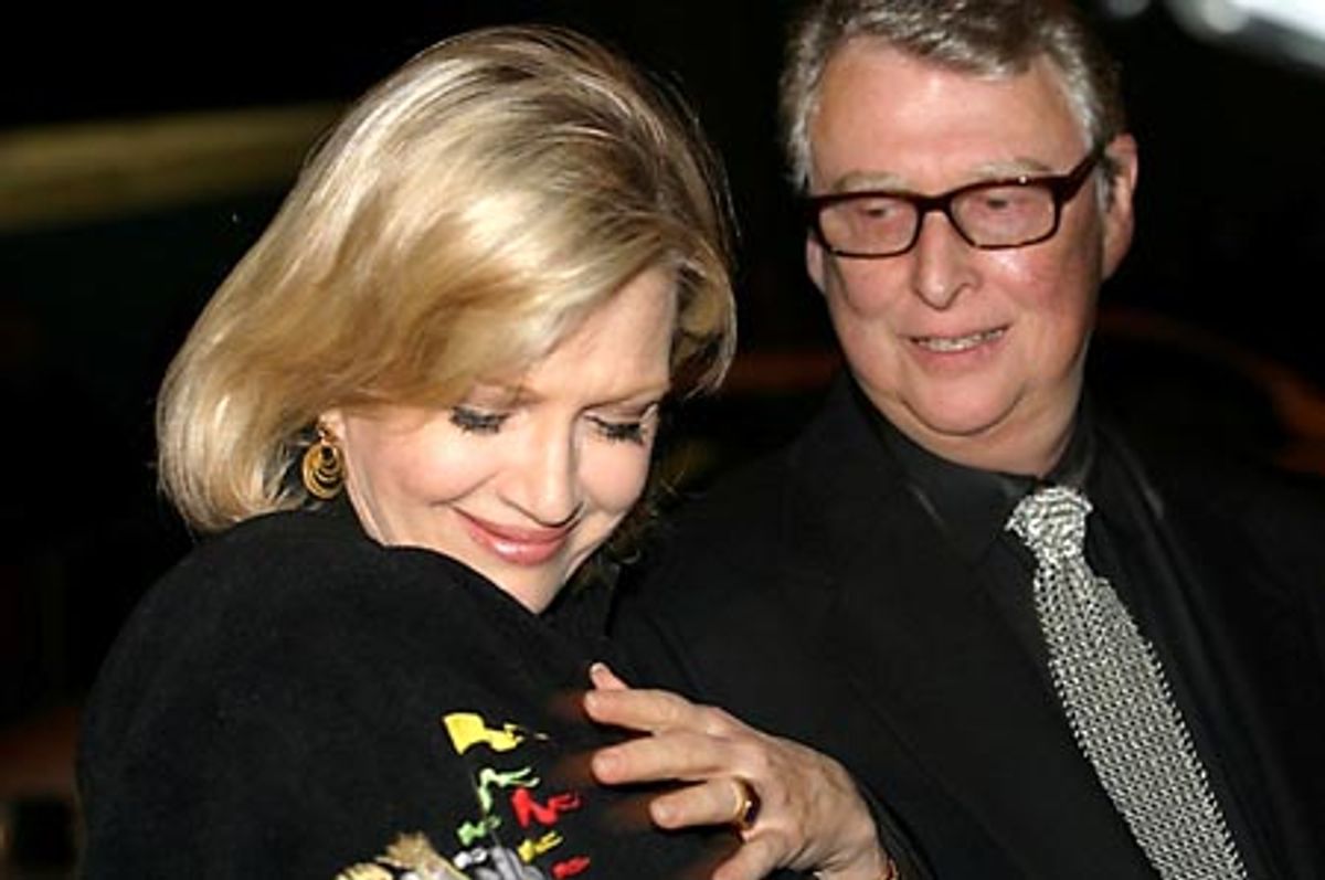 Diane Sawyer showing off her SPAMALOT jacket to husband, Mike Nichols (director)  at 