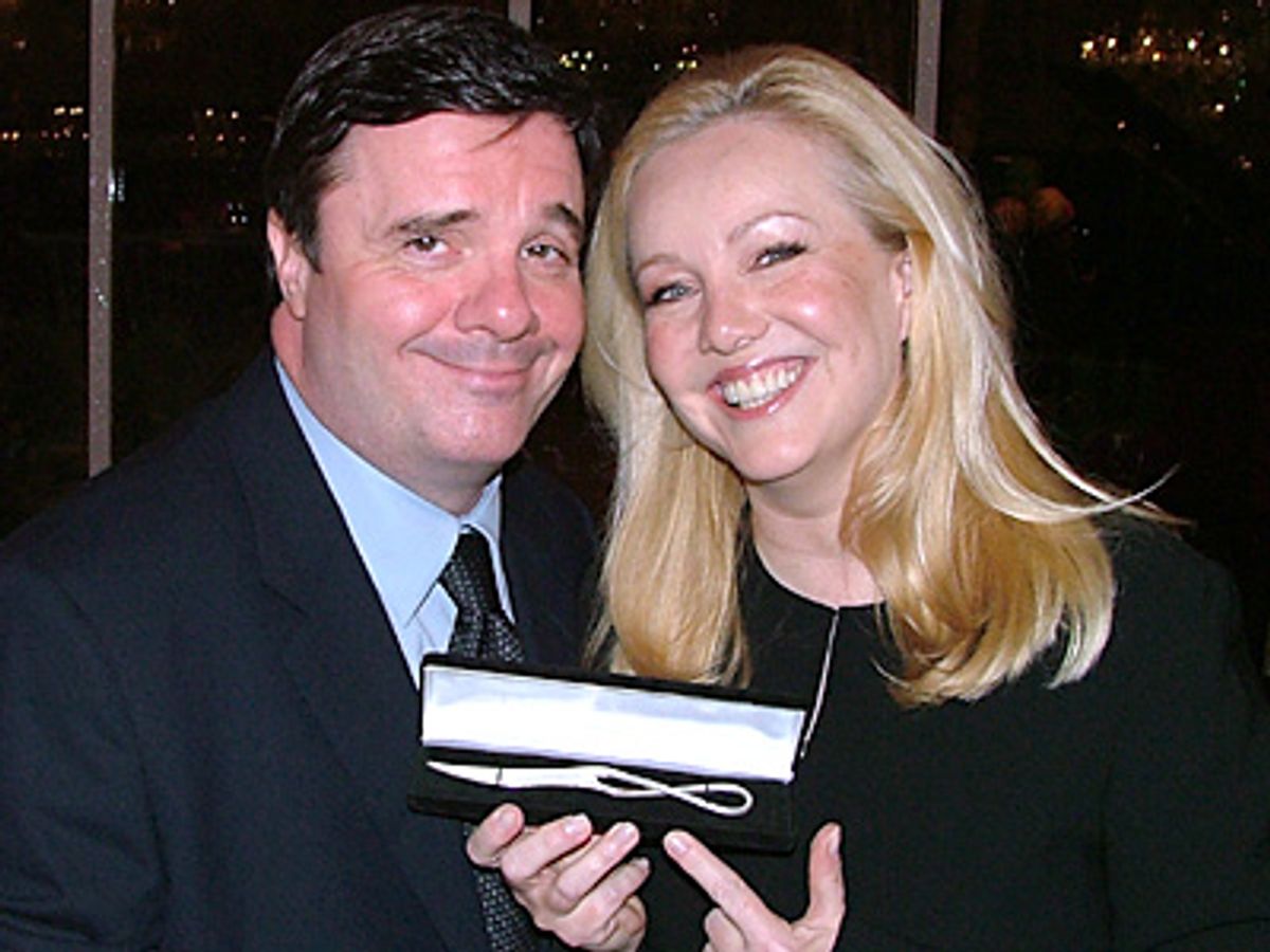 Nathan Lane with Susan Stroman showing off her letter opener at 