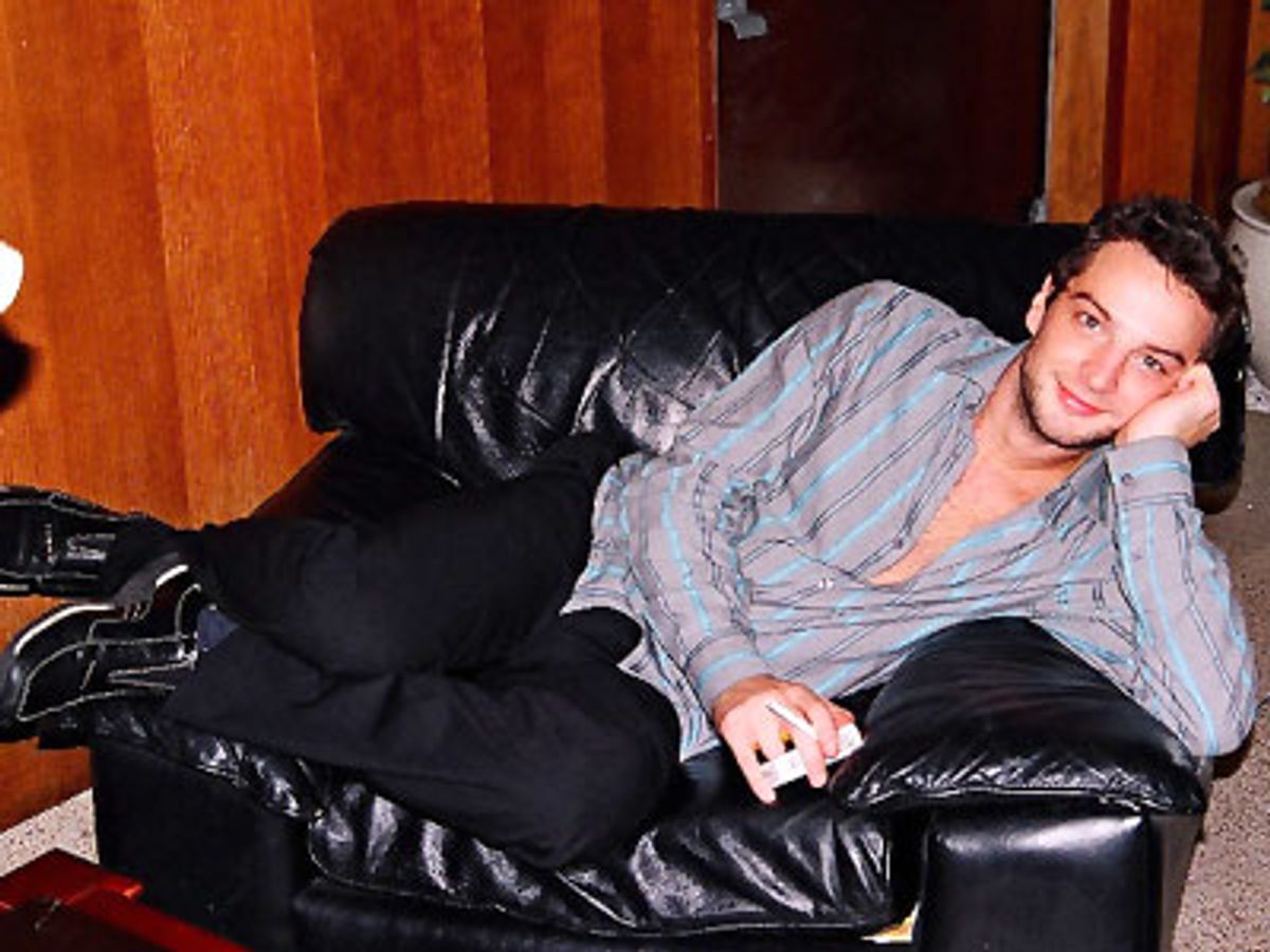 Euan enjoys a few moments lounging at the party after having sung
a very rousing 'Why God Why' at 