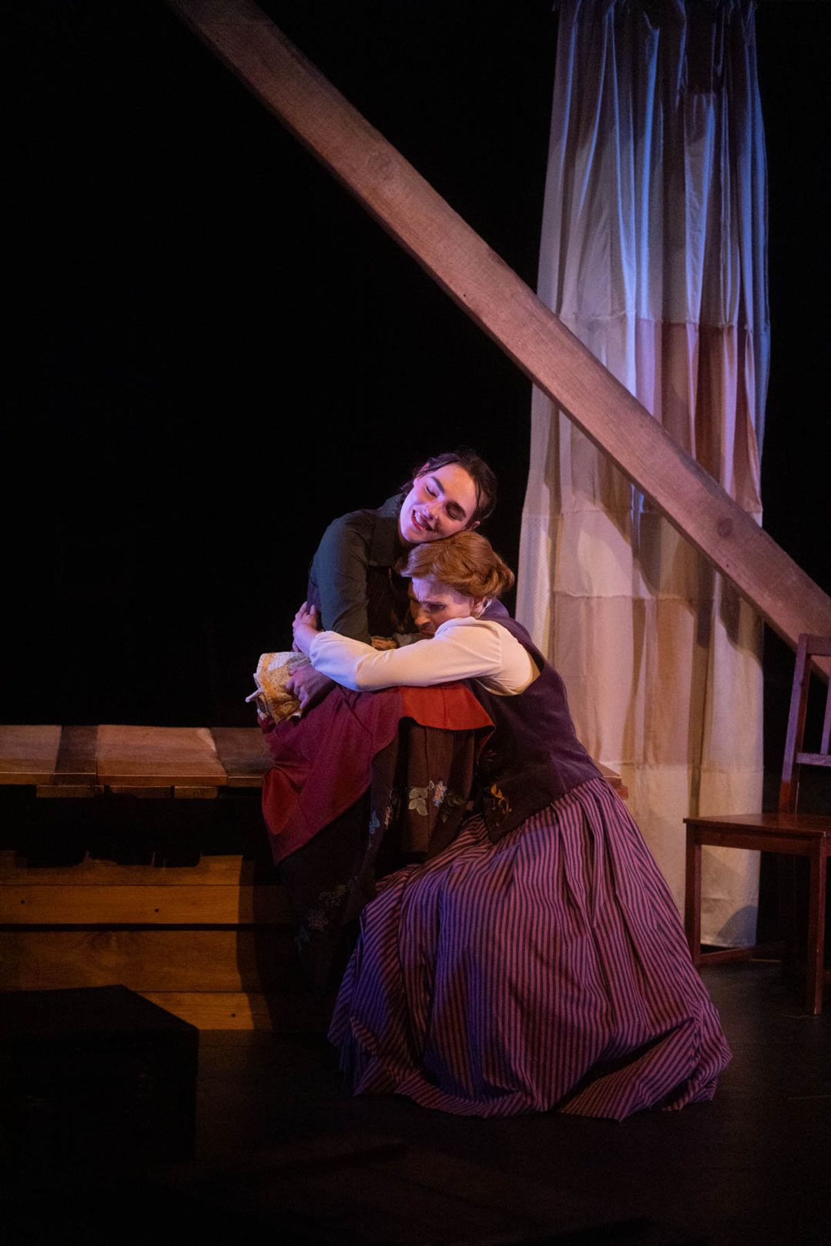 Jo (Mackenzie Moyer) and Meg (Amy Rene Byrne) in mourning. Photo by Kyle Huggins. Jo (Mackenzie Moyer) and Meg (Amy Rene Byrne) in mourning. Photo by Kyle Huggins.