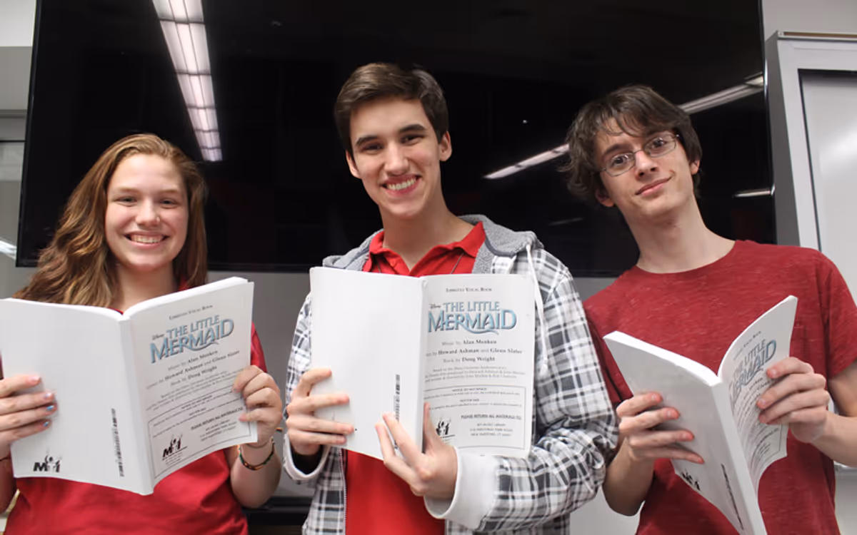 Emily DeCrotie as Ariel, Michael Kirk as Prince Eric, and John Walczyk as Grimsby. Emily DeCrotie as Ariel, Michael Kirk as Prince Eric, and John Walczyk as Grimsby.