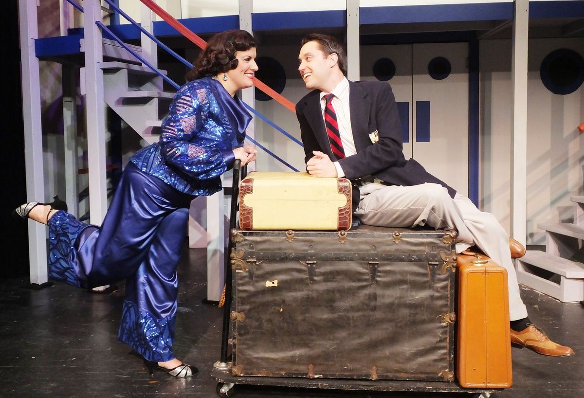 Reno Sweeney (Danielle Caralis of Birmingham) confesses her admiration to Billy Crocker (Michael McKiddy of Warren) in Cole Porter’s “De-Lightful” musical Anything Goes. Reno Sweeney (Danielle Caralis of Birmingham) confesses her admiration to Billy Crocker (Michael McKiddy of Warren) in Cole Porter’s “De-Lightful” musical Anything Goes.