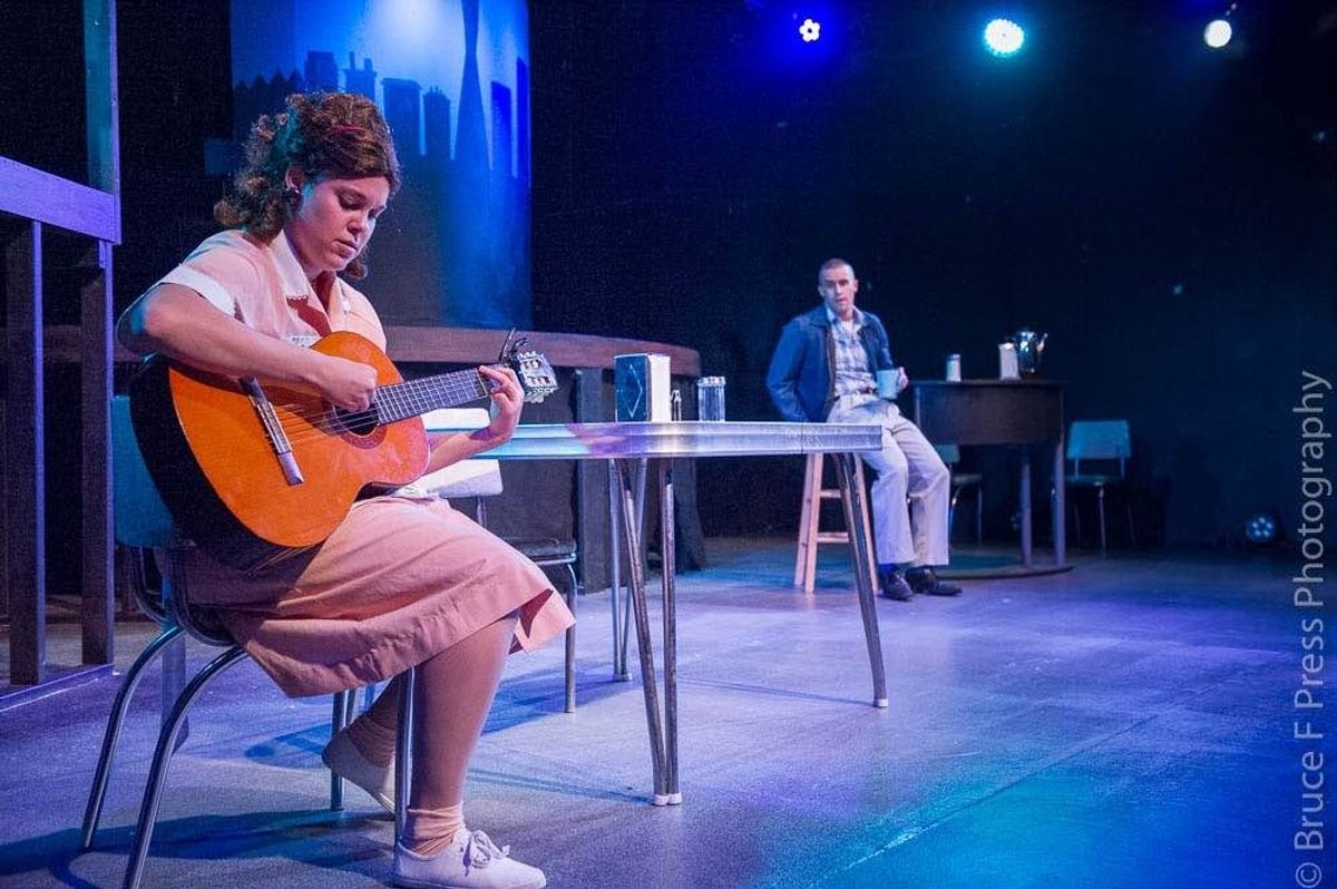 Courtney Branch as Rose strums her guitar in her mother's diner while Christian Hoff as Birdlace looks on. Courtney Branch as Rose strums her guitar in her mother's diner while Christian Hoff as Birdlace looks on.