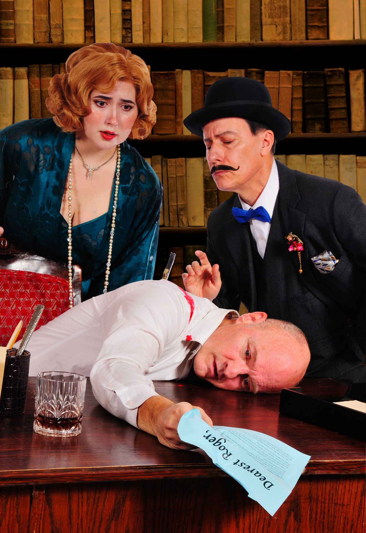 Ashley Pio as Nora Ackroyd, Todd Hermanson as Roger Ackroyd, and Mark Schwahn as Hercule Poirot in The Murder of Roger Ackroyd, performing at Lakewood Theatre Company, located at 368 S. State Street, 