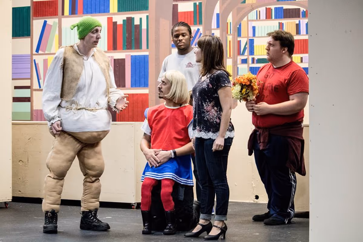 1.            Shrek (Steven Dow) pleads with Fiona (Candice Castro,) while Lord Farquaad (Josè Bernard) and two of his men (Amire Collins and Dustin McHale) look on