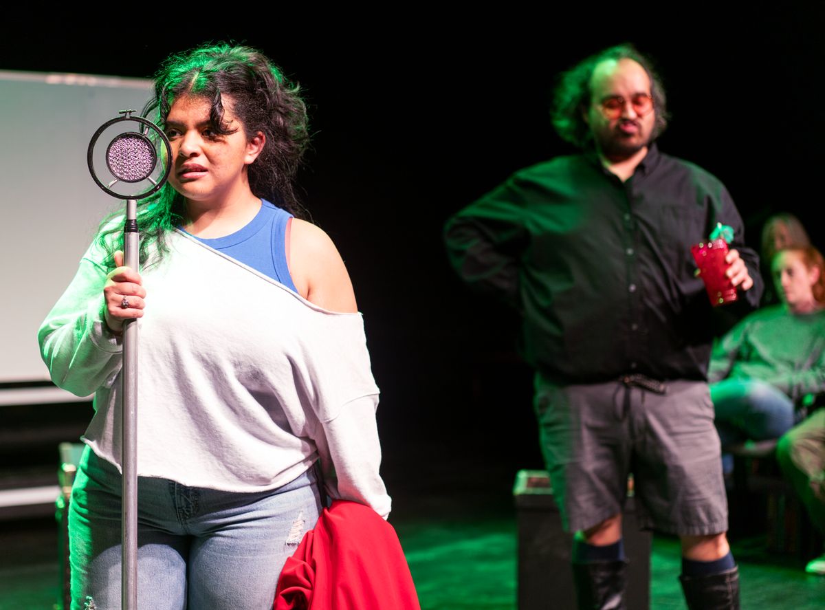 Anette Orellana as Liliana Tzintz n and Henry Ballesteros as Fernando Calder n in Spit in Your Face by Paul Heller and Alberto Lomnitz Credit: Christine Bedenis, Detroit Repertory Theatre Anette Orellana as Liliana Tzintz n and Henry Ballesteros as Fernando Calder n in Spit in Your Face by Paul Heller and Alberto Lomnitz Credit: Christine Bedenis, Detroit Repertory Theatre
